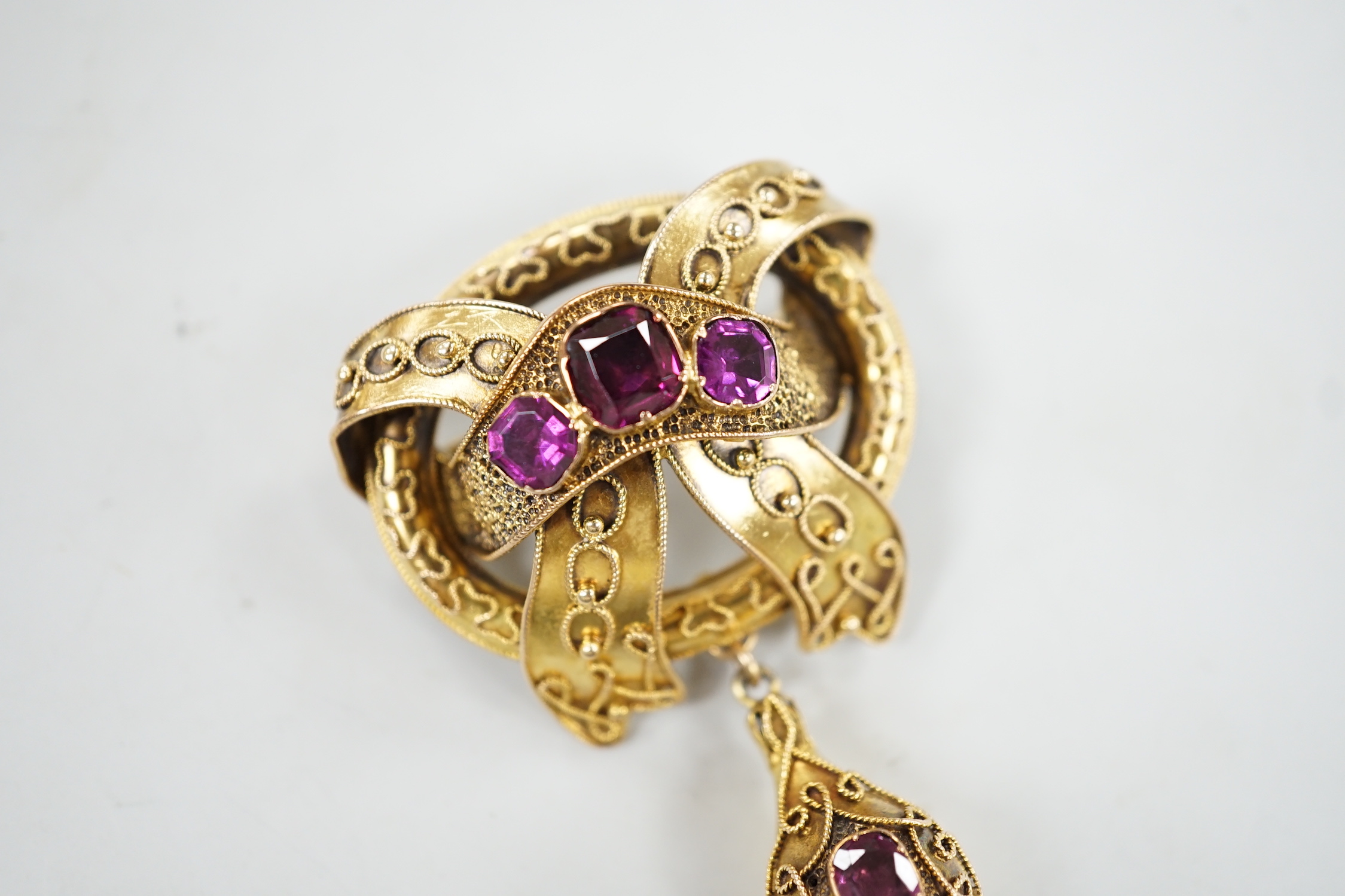 A Victorian yellow metal and foil backed garnet? set cannetile work drop brooch, 56mm, gross weight 12.7 grams.